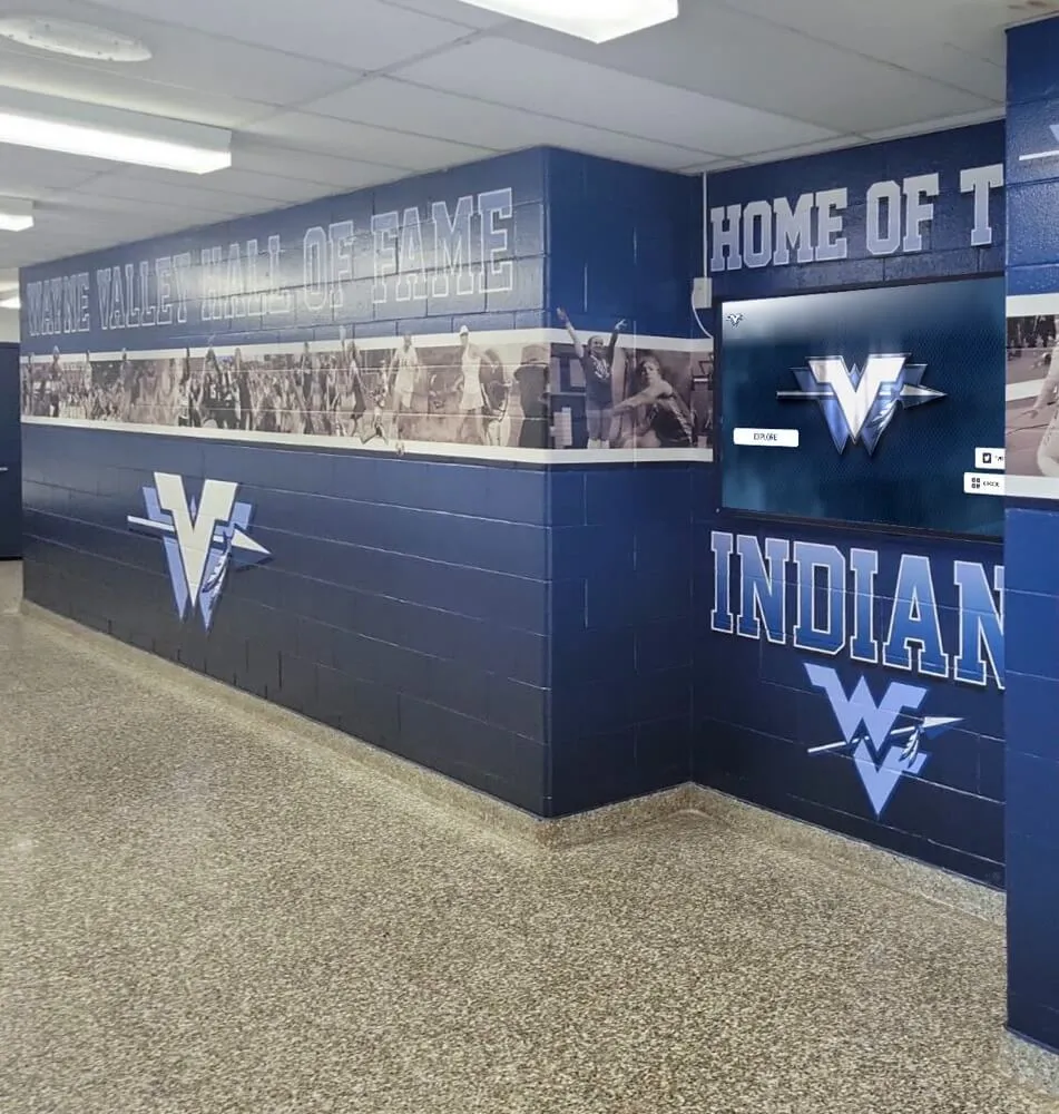 School hallway with athletic branding and recognition